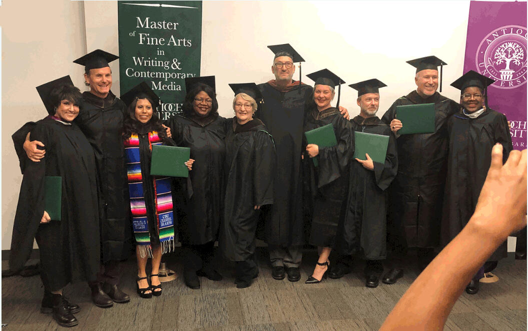 Colin MacKenzie Mitchell: MFA graduation, pictured third from right.